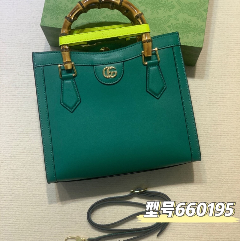 G*u*i top handle bags